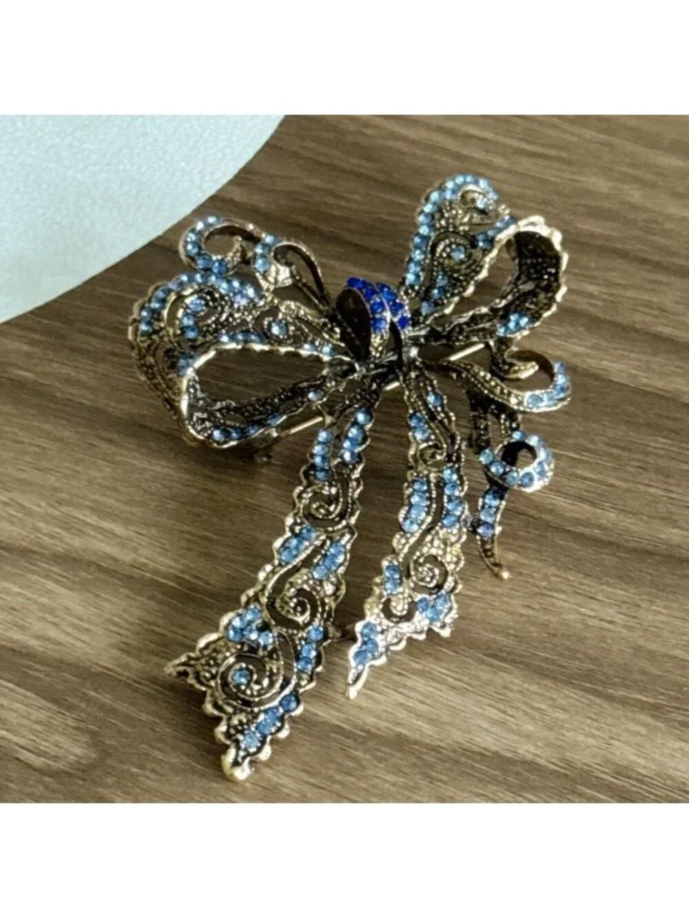 Gold and Blue Bow Brooch Q600
